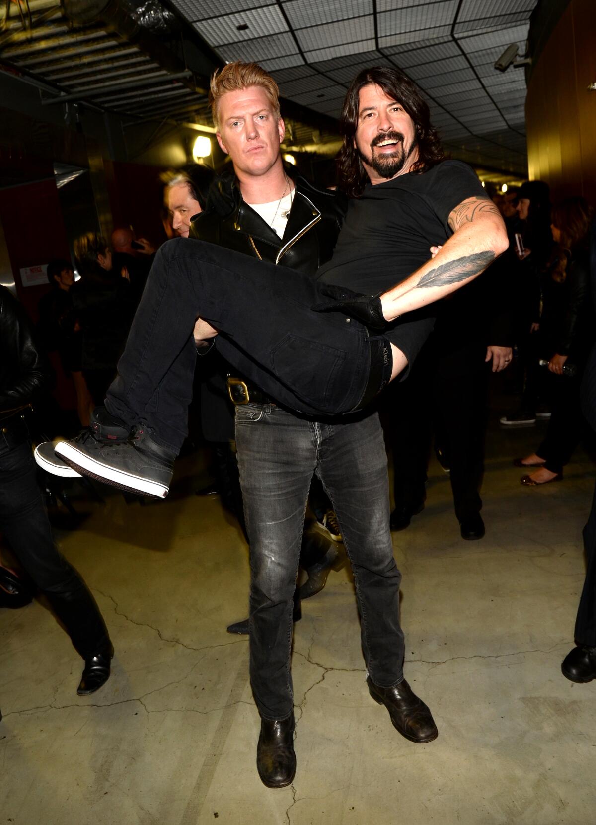 Josh Homme and Dave Grohl at the 56th Grammy Awards in 2014.