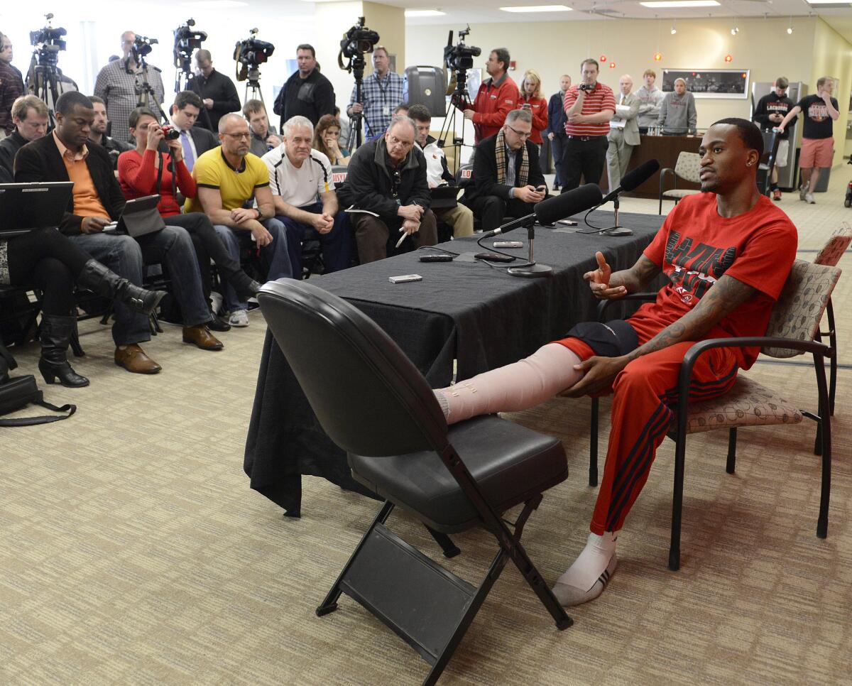 University of Louisville basketball player Kevin Ware answers questions during a news conference at the school's KFC Yum! Center practice facility.