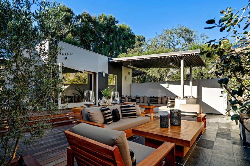 Our Brentwood Home of the Week makes full use of its real estate with covered and open-air lounging spaces.
