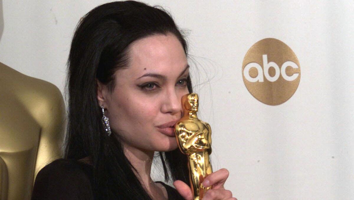 That Oscar trophy wasn't the only one smooched by Angelina Jolie's famous lips at the 72nd Academy Awards. The actress planted a kiss on older brother James Haven with a force that set rumor-mongers atwitter with word of an incestuous relationship. It didn't help that the excited Jolie launched into her acceptance speech for lead role in "Girl, Interrupted" with an ode to the sibling: "I'm in shock, and I'm so in love with my brother right now," she giggled. "He just held me and said he loved me and I know he's so happy for me."