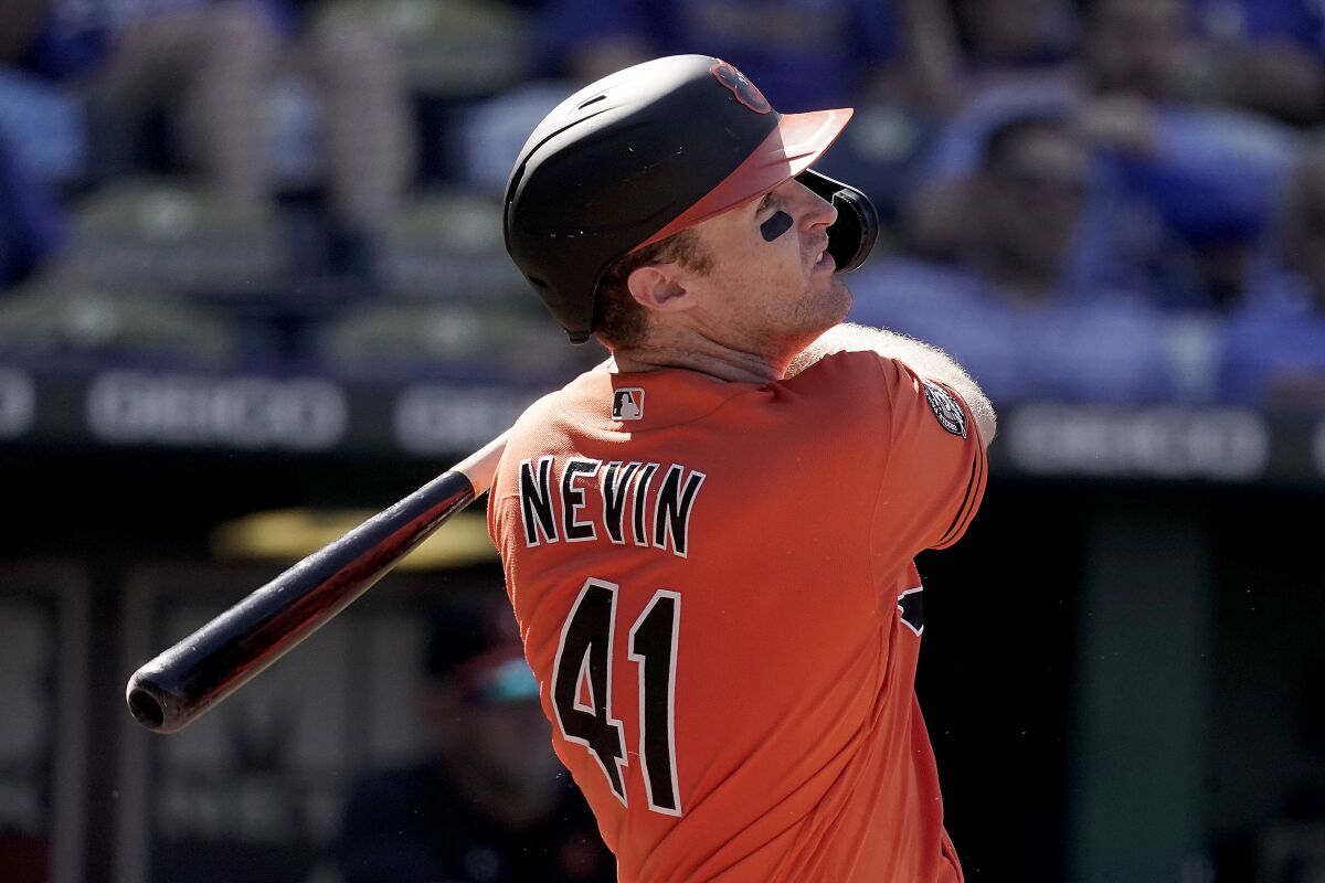 Baltimore Orioles' Tyler Nevin watches his three-run home run during the sixth inning of a baseball game against the Kansas City Royals Saturday, June 11, 2022, in Kansas City, Mo. (AP Photo/Charlie Riedel)