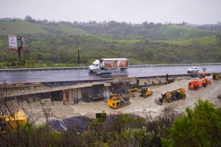 Oceanside, CA - March 21: On Tuesday, March 21, 2023 in Oceanside, CA. rains have delayed ongoing repairs to the sinkhole on westbound state Route 78, just west of College Boulevard. (Nelvin C. Cepeda / The San Diego Union-Tribune)