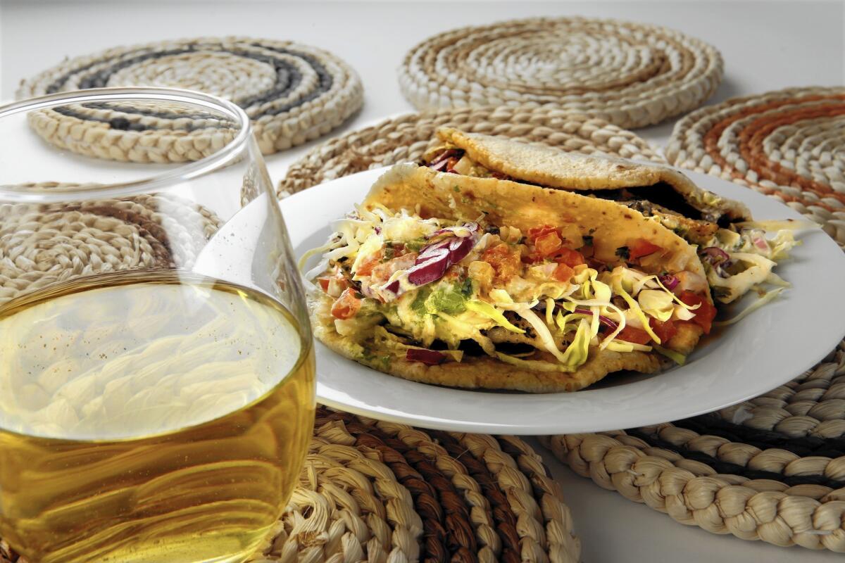 White wine is a refreshing accompaniment for summery fish tacos.
