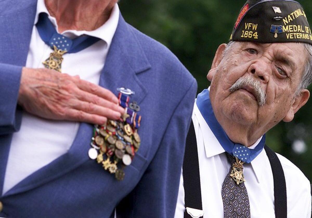 Alejandro R. Ruiz Sr. wears his Medal of Honor at an unveiling ceremony in 2001 for a new war memorial monument at Bell Gardens Park.