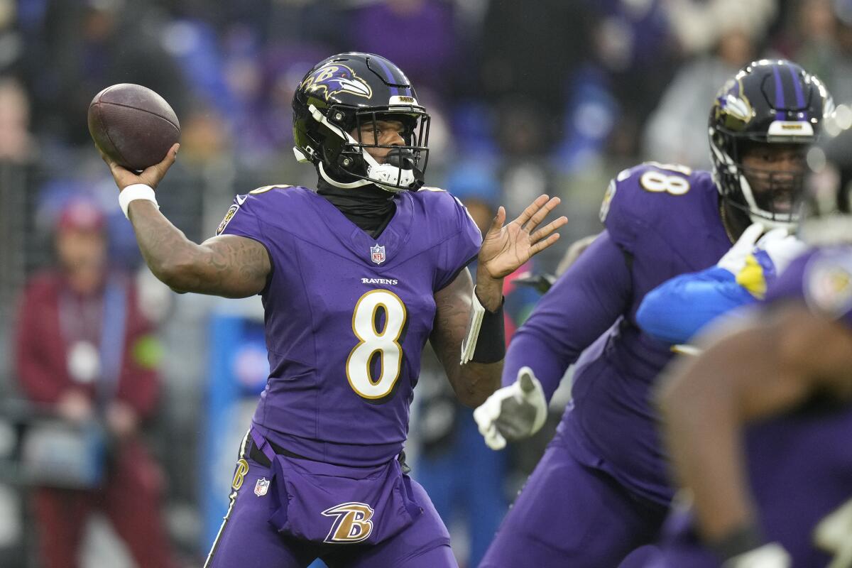 Baltimore Ravens quarterback Lamar Jackson throws a pass in the first half Sunday.