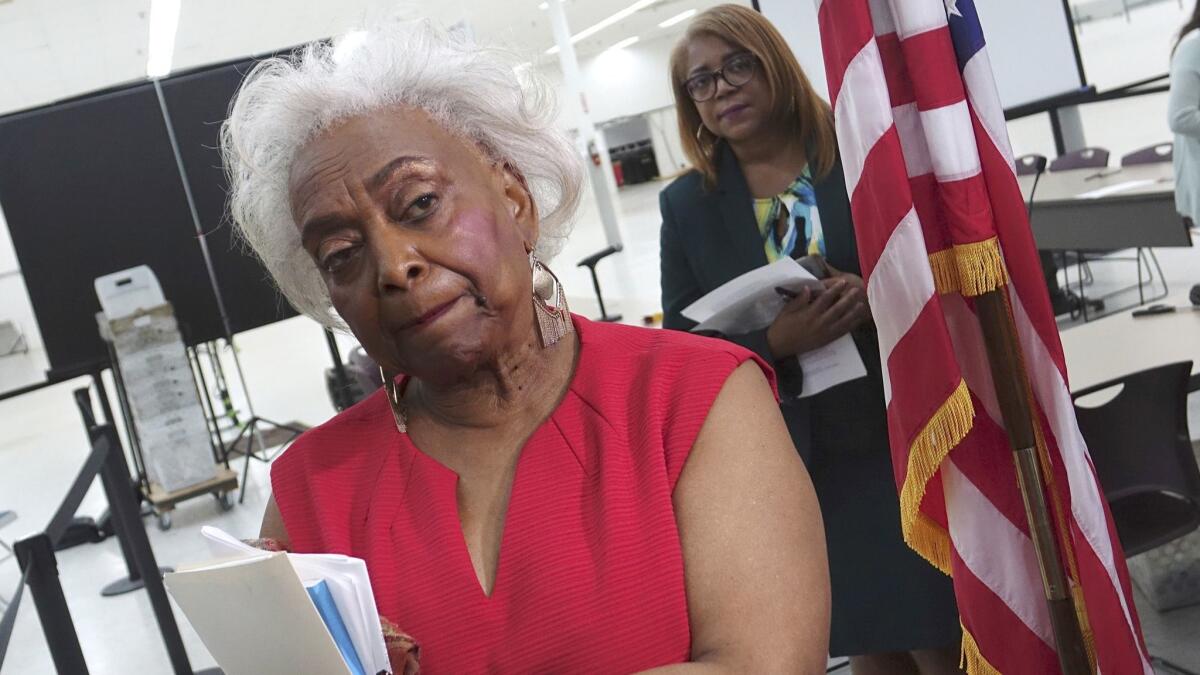Broward County Supervisor of Elections Brenda Snipes listens to questions from the media at the Broward Supervisor of Elections office in Lauderhill, Fla., on Sunday.