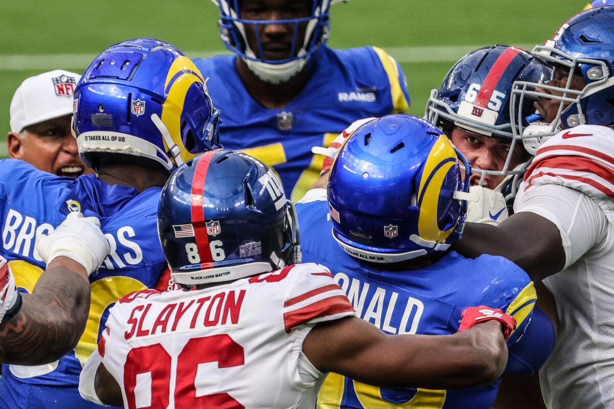 Rams defensive end Aaron Donald and New York Giants center Nick Gates get into a scuffle.