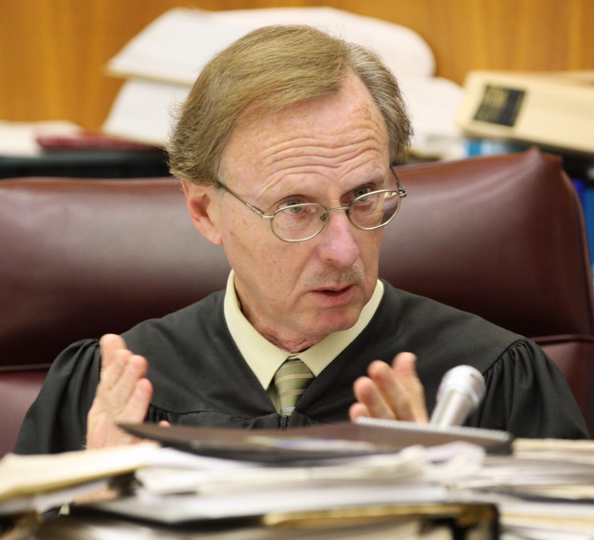 Judge Howard Shore speaks to members of the jury