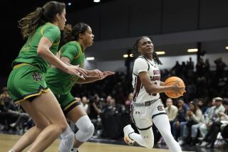 South Carolina guard MiLaysia Fulwiley, right, drives to the basket against Notre Dame.