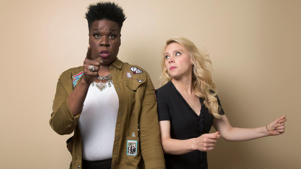 Leslie Jones, left, and Kate McKinnon are two of many TV personalities invited to join the Academy of Motion Picture Arts and Science. The women starred in "Ghostbusters" but are also largely known for their work on "Saturday Night Live."