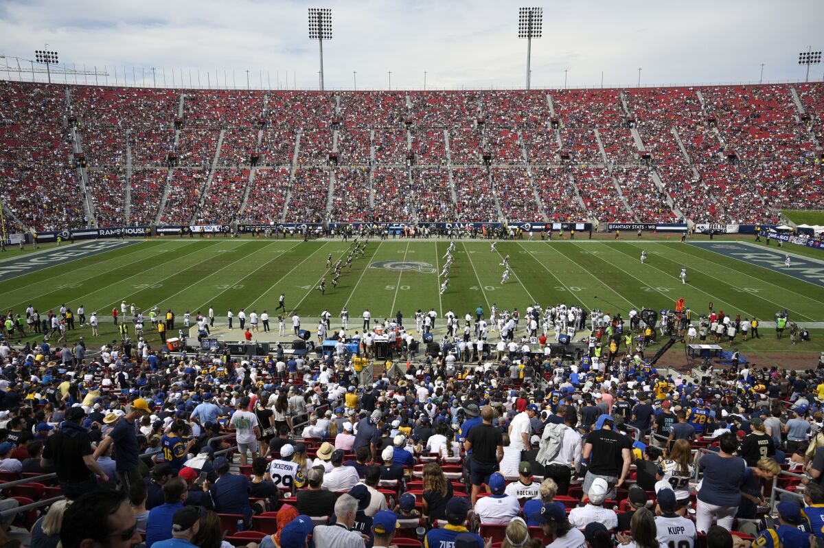 An overall view shows the second half kickoff during a game between the Rams and New Orleans Saints on Sept. 15 at the Coliseum.