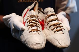 Bill Bowerman’s handmade prototype logo track spikes. Photographer: Cindy Ord/Getty Images