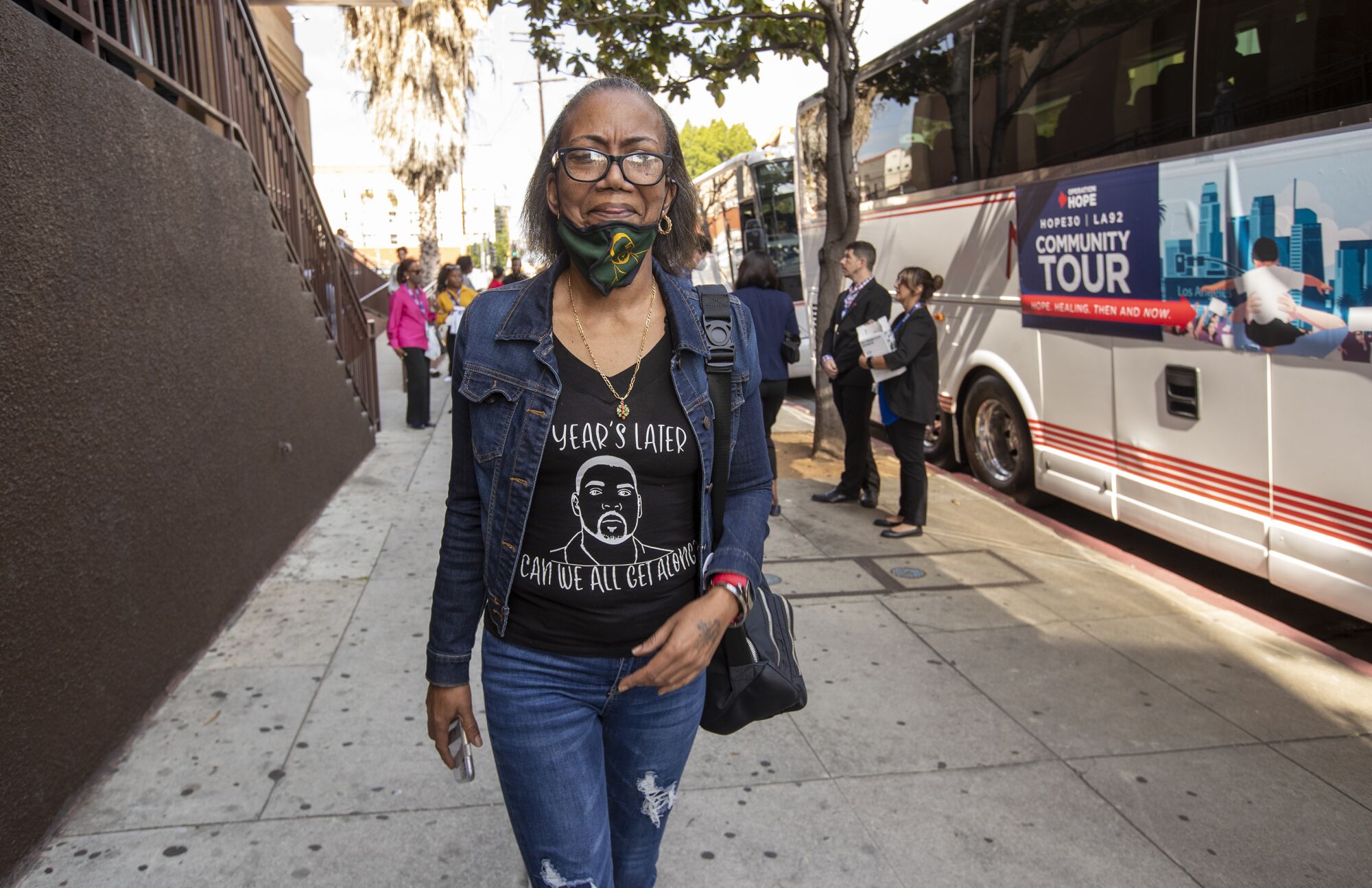 Dennetta King, former wife of the late Rodney King, wears a shirt with an image in his likeness.
