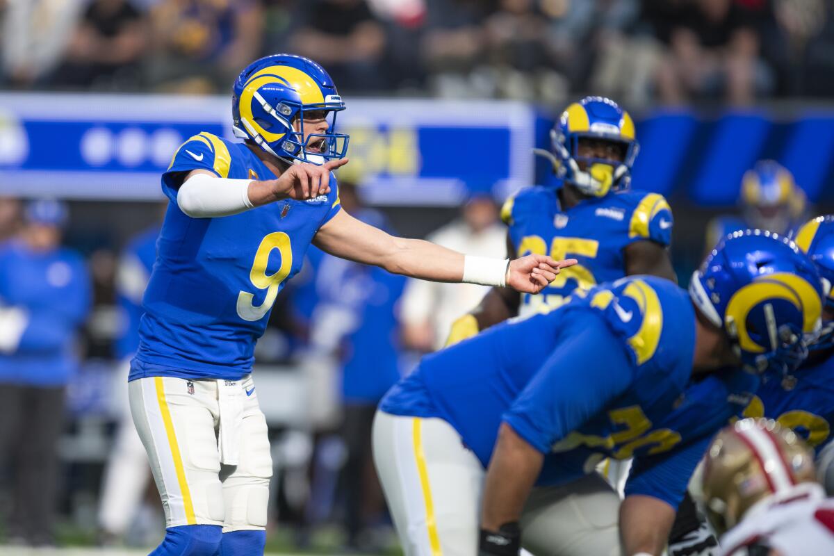 Rams quarterback Matthew Stafford gestures before taking a snap against the San Francisco 49ers on Dec. 9.
