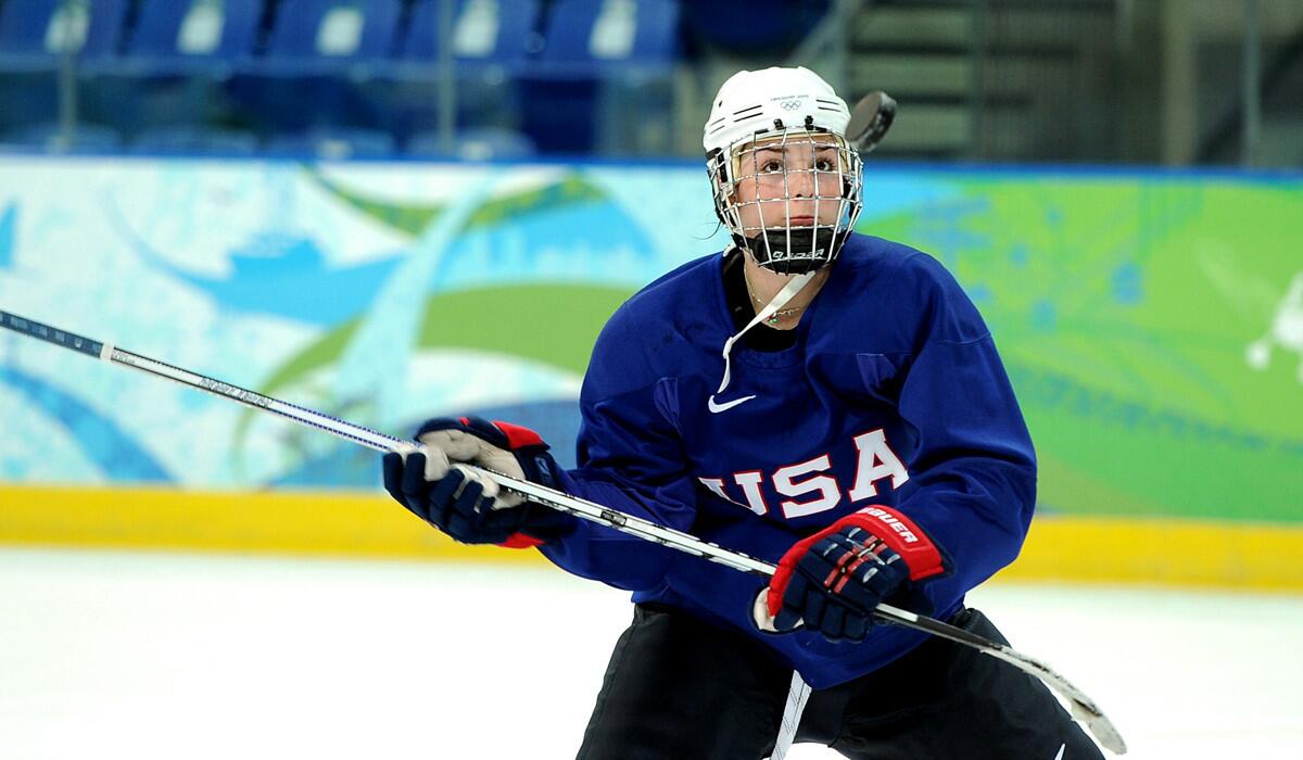 Hilary Knight practices a trick shot after an Olympic team practice in Vancouver in 2010.