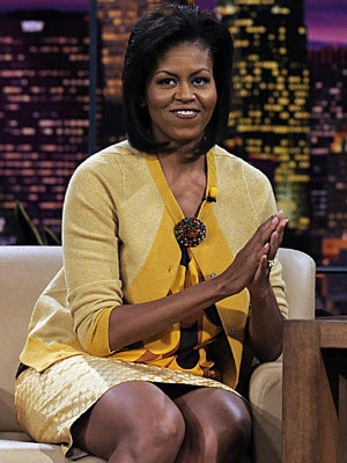 Michelle Obamas store-bought outfits resonate with the public.