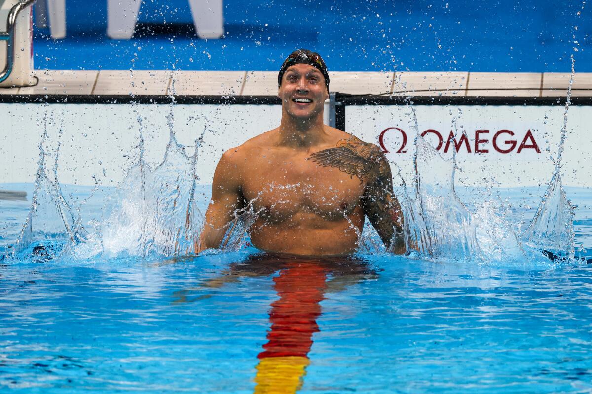 U.S. swimmer Caeleb Dressel celebrates after winning the 100-meter freestyle on Thursday.