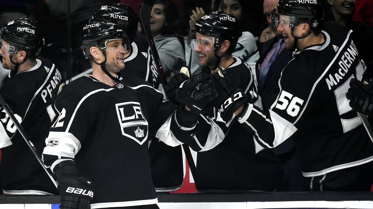 Kings right wing Marian Gaborik celebrates with teammates after scoring against the Wild during the third period of a 5-2 victory on Tuesday.
