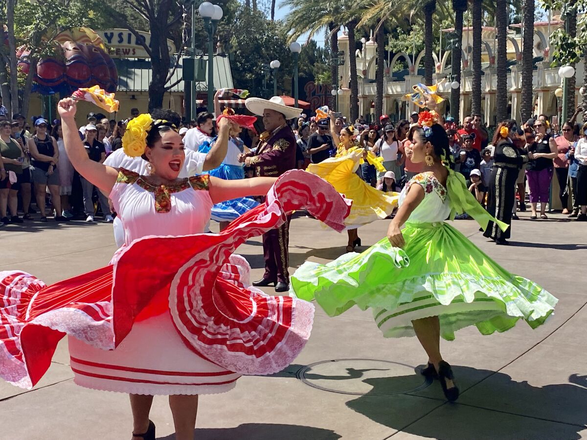 The Storytellers of Plaza de la Familia perform at Disney California Adventure Park.