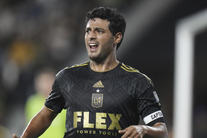 Los Angeles FC forward Carlos Vela runs across the field during the second half of an MLS soccer match.