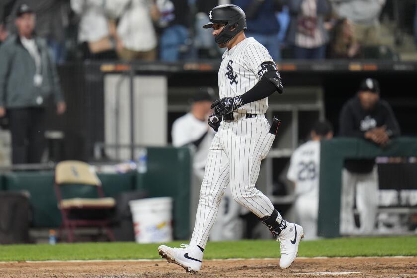 Chicago White Sox's Danny Mendick runs the bases after hitting a home run during the fifth inning of a baseball game against the Minnesota Twins, Tuesday, April 30, 2024, in Chicago. (AP Photo/Erin Hooley)
