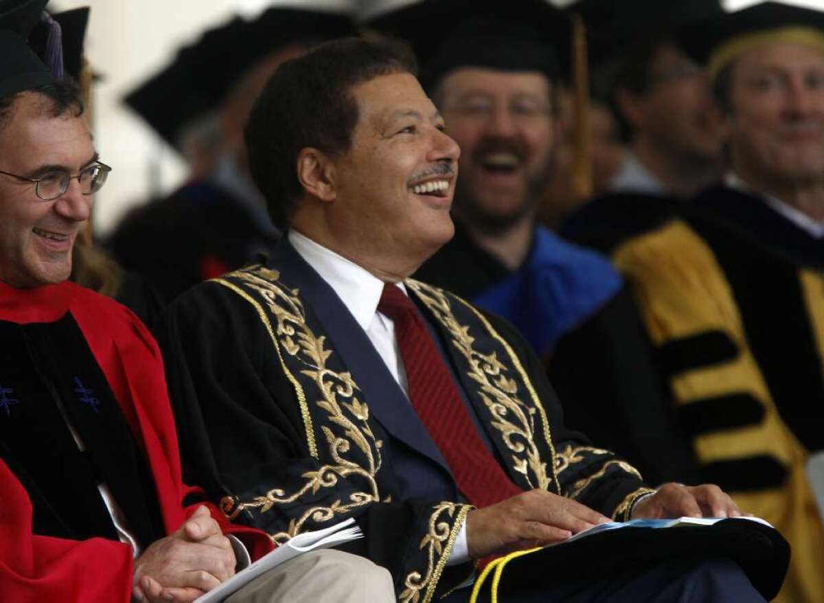 Nobel Prize winner Ahmed Zewail laughs before his 2011 commencement address at Caltech because he was introduced incorrectly as a Pulitzer Prize winner. The chemistry and physics professor died Tuesday at age 70.