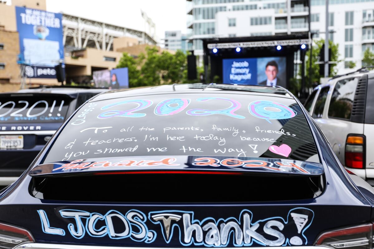 Messages on a car express the gratitude of a member of La Jolla Country Day School's Class of 2020.