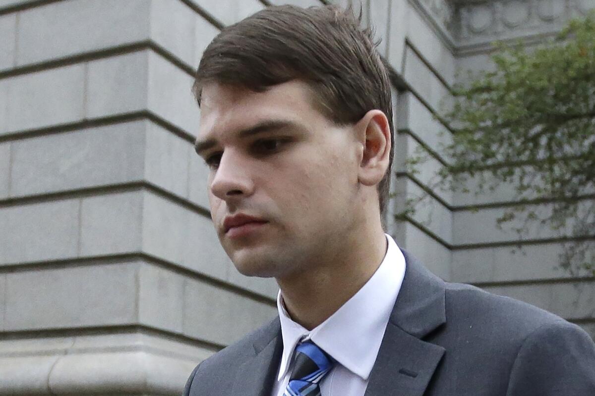 FILE - In this Aug. 21, 2019, file photo, Nathan Carman departs federal court in Providence, R.I. Carman, charged with killing his mother at sea in a plot to inherit millions of dollars, asked a federal court Wednesday, July 6, 2022, to authorize his release from custody pending trial. (AP Photo/Steven Senne, File)