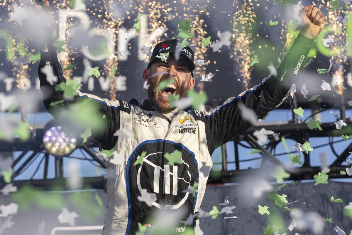 Ross Chastain celebrates after winning a NASCAR Cup Series auto race at Circuit of the Americas.