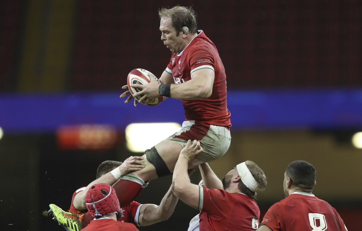 FILE - In this Saturday, Feb. 27, 2021 file photo, Wales' Alun Wyn Jones gathers the ball in a line out during the Six Nations rugby union match between Wales and England at the Millennium stadium in Cardiff, Wales. Wales great Alun Wyn Jones was selected on Thursday May 6, 2021, as captain of the British and Irish Lions for the first time for the tour of South Africa. (David Davies/Pool via AP, File)