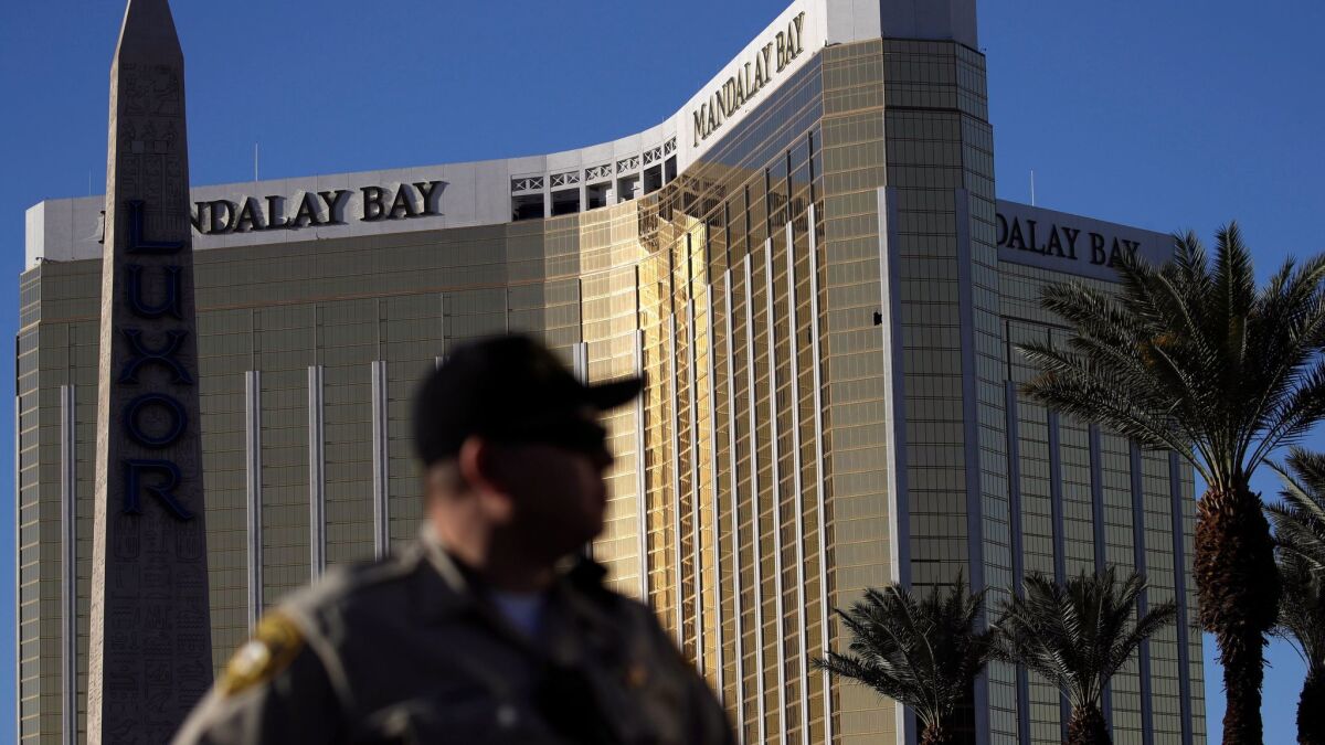 A Las Vegas police officer outside the Mandalay Bay Resort and Casino days after the mass shooting.