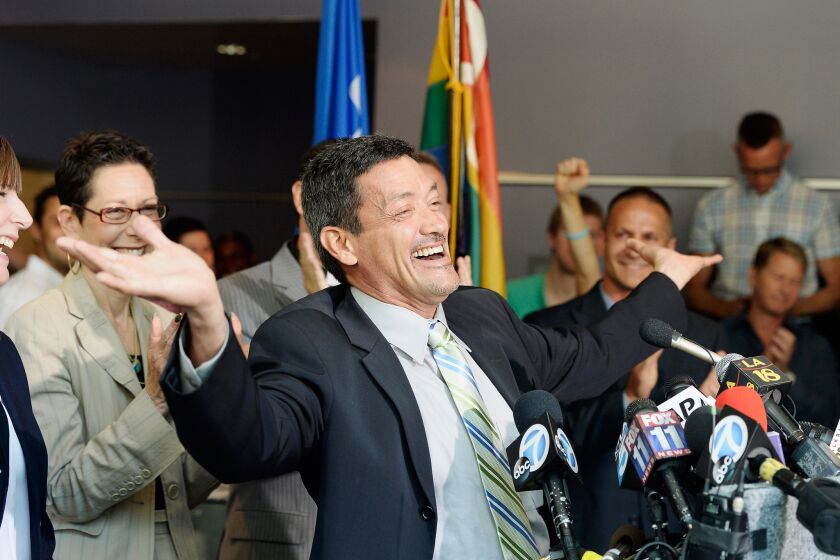 West Hollywood Councilman John Duran celebrates during a news conference at City Hall after the U.S. Supreme Court actions on gay-marriage cases.