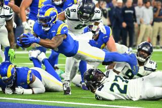 Los Angeles, California December 4, 2022-Rams running back Cam Akers dives for a touchdown.