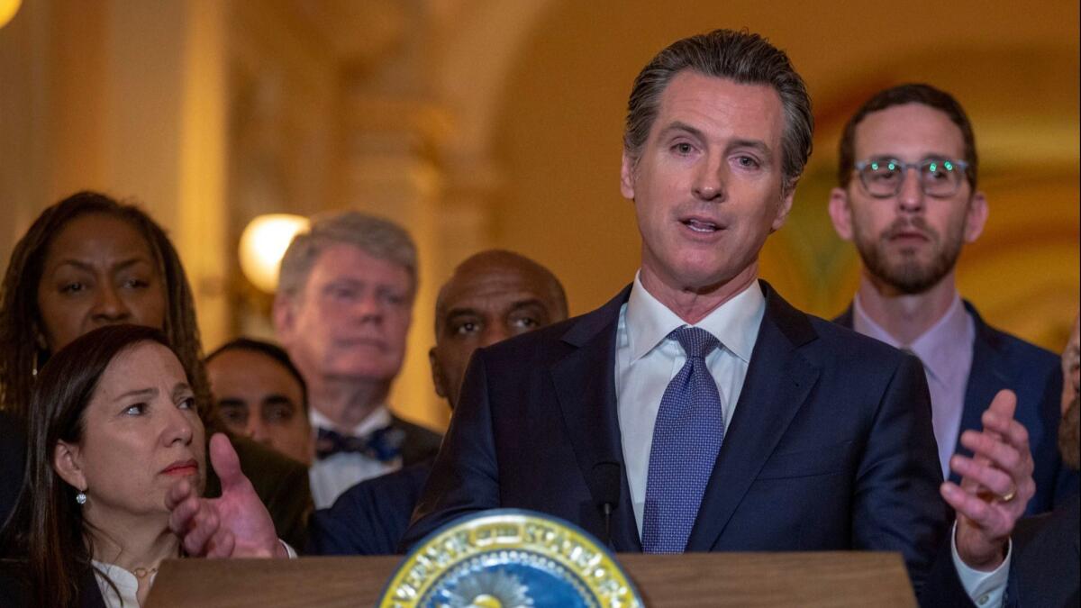 Gov. Gavin Newsom announces a moratorium on California's death penalty during a news conference Wednesday at the state Capitol in Sacramento.
