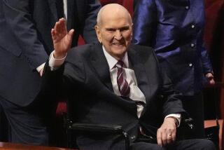 FILE - President of The Church of Jesus Christ of Latter-day Saints Russell M. Nelson waves as he departs the church's twice-annual conference, April 7, 2024, in Salt Lake City. (AP Photo/Rick Bowmer, File)