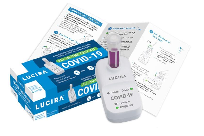 This image provided by Lucira Health shows the Lucira COVID-19 all-in-one home test kit. The FDA granted emergency authorization on Tuesday, Nov. 17, 2020, to the single-use test kit from Lucira Health, a California manufacturer. The test can performed entirely at home and delivers results in 30 minutes. (Lucira Health via AP)