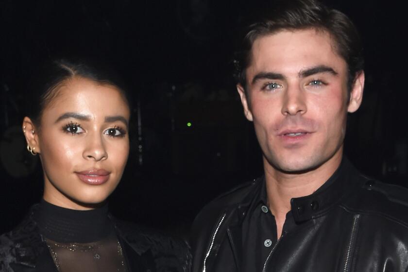Sami Miro and Zac Efron, seen at a St. Laurent event in February in L.A., have reportedly split.