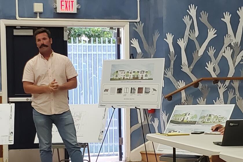 Murfey Co. principal Russ Murfey presents the latest plans for Adelante Townhomes to the Bird Rock Community Council. 