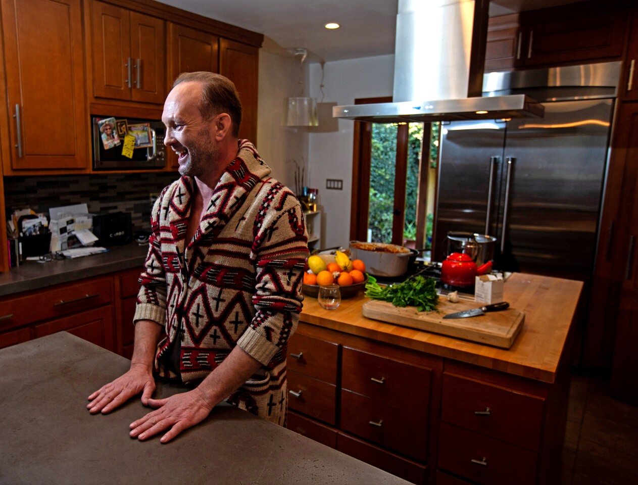 Los Angeles, CA., January 15, 2020: Andrew Howard cooks in his kitchen on Wednesday, January 15, 2020 in Los Angeles, California. Howard stars on the HBO series, "Watchmen," and in the upcoming HBO limited series, "Perry Mason." currently filming, as well as Christopher Nolan’s new film, "Tenet."(Jason Armond / Los Angeles Times)