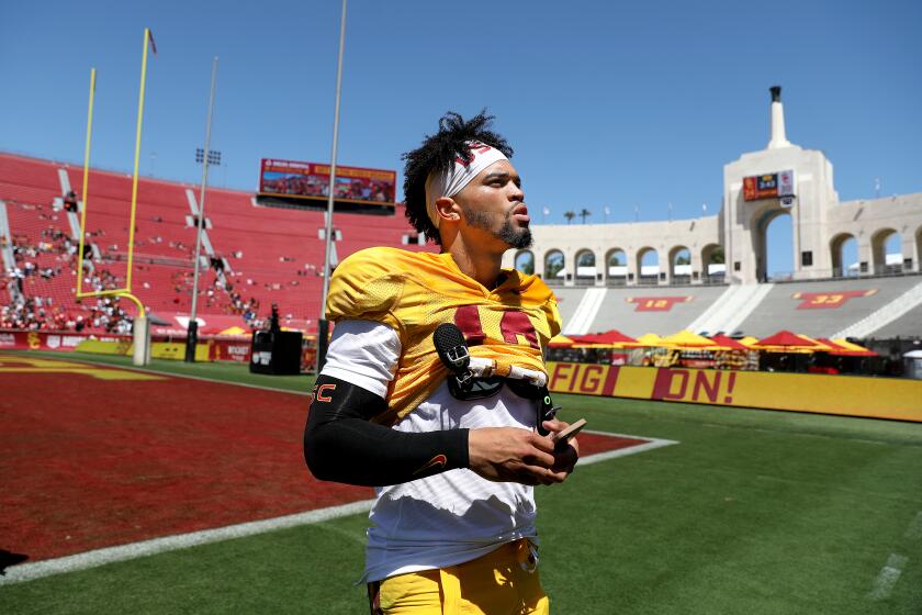 USC quarterback Caleb Williams looks on at the end of the Trojans' spring game at the Coliseum on April 23, 2022.
