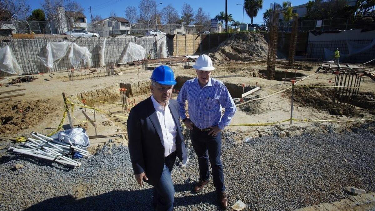 At their construction site for the Nimitz Crossing in Point Loma, Rudy Medina (left) and Andrew T. Luce (right) from Next Space Development. The project will construct 24 new apartment units, including 9000 sq. ft. of ground level retail space.