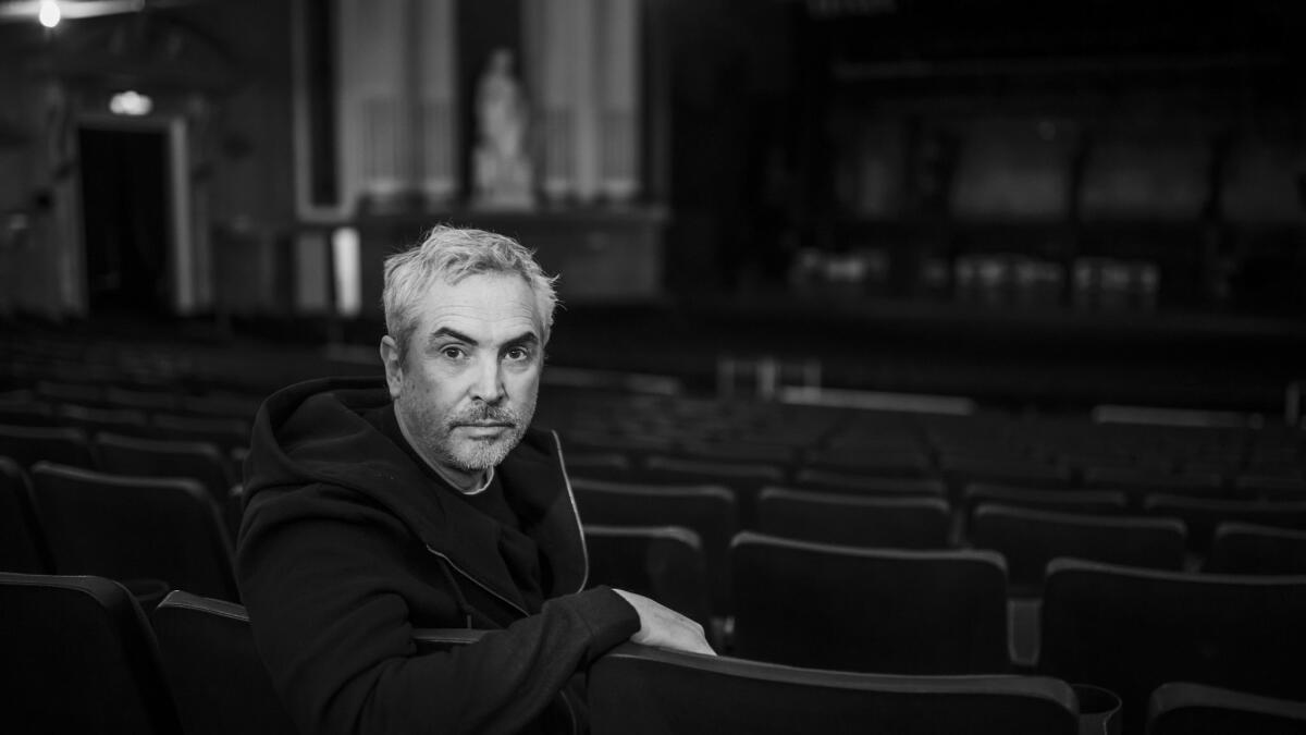 Alfonso Cuaron sits inside the Teatro Metropolitan in Mexico City, where he shot keys scenes from "Roma."