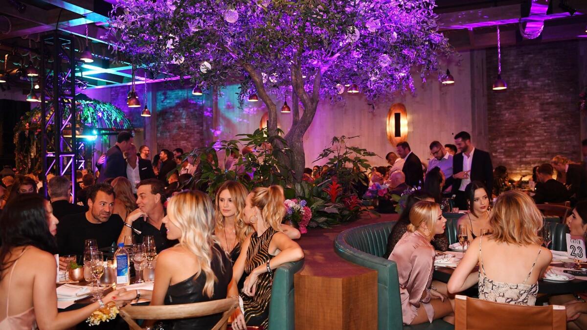A-listers including George Clooney and Cindy Crawford were among those attending a private party at Catch on Oct. 26, prior to its opening.