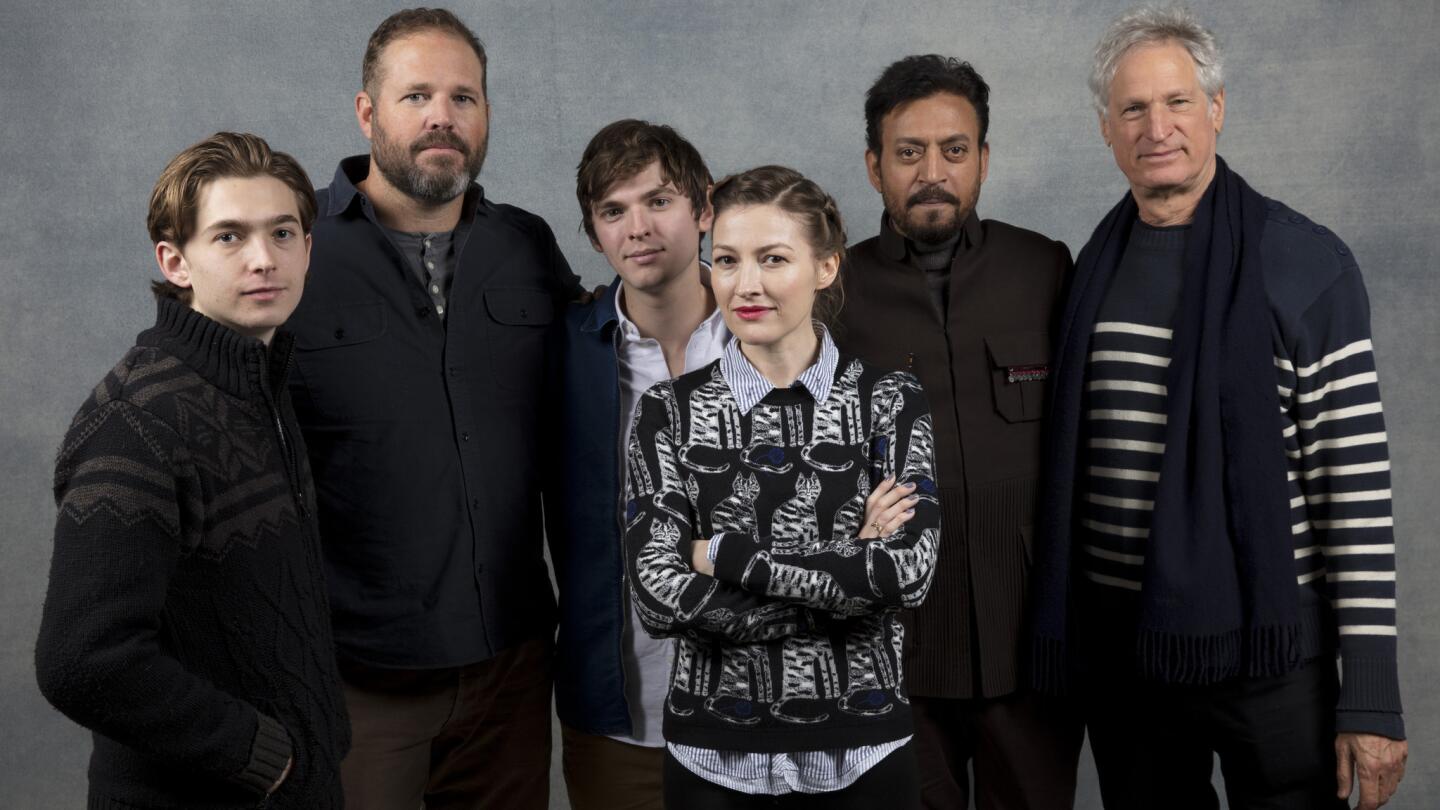 Actor Austin Abrams, left, actor David Denman, actor Bubba Weiler, actress Kelly Macdonald, actor Irrfan Khan and writer-director Marc Tutrletaub, from the film "Puzzle."