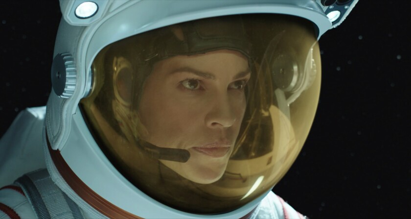 Hilary Swank as astronaut Emma Green