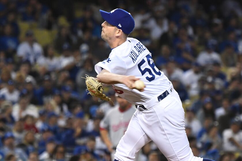 LOS ANGELES, CALIFORNIA OCTOBER 3, 2019-Dodgers pitcher Adam Kolarek throws a pitch against the Nationals in Game 1 of the NLDS at Dodger Stadium Thursday. (Wally Skalij/Los Angeles Times)