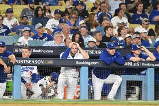 Los Angeles, CA - October 07: Dodgers are down 10 to 0 thru seven innings against the Arizona.