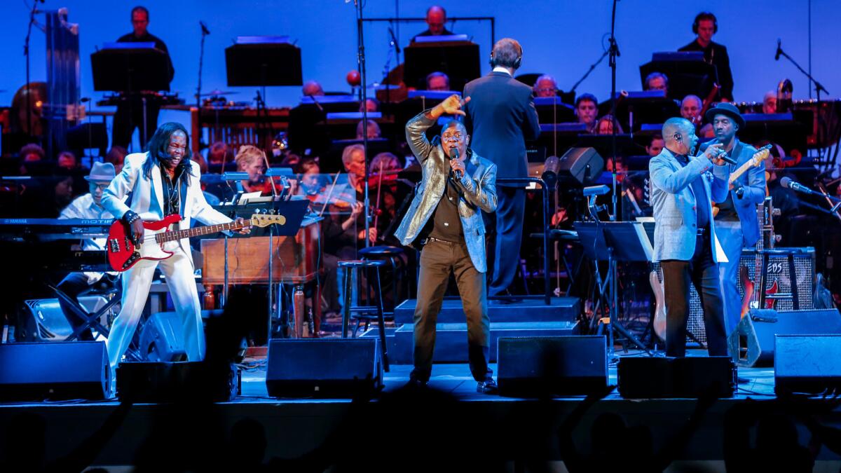 Verdine White, left, Philip Bailey and Ralph Johnson of Earth, Wind & Fire.