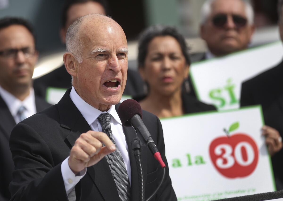 Gov. Jerry Brown speaks in support of Proposition 30 at an elementary school in San Diego.