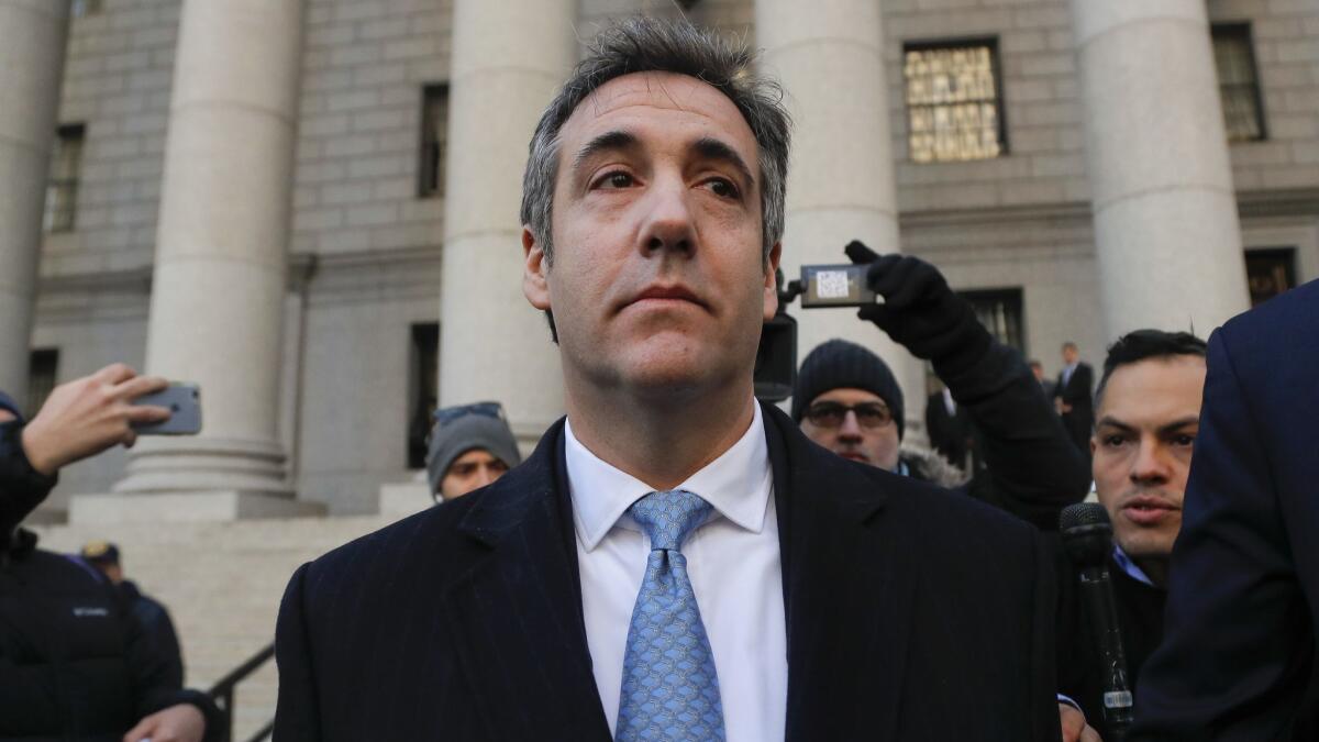 Michael Cohen leaves court after pleading guilty to lying to Congress about a Russian real estate deal.